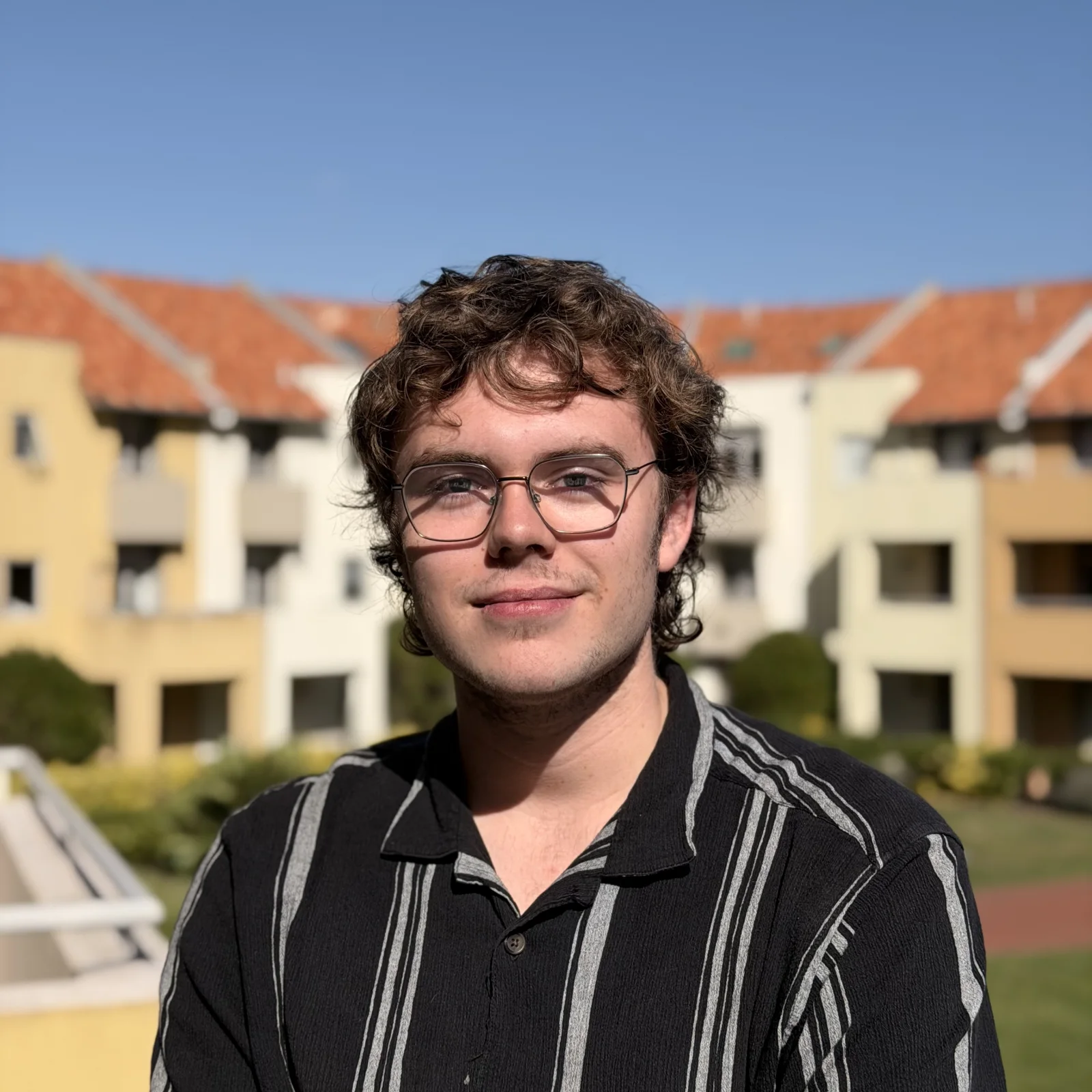 Portrait of Ajay Quirk outdoors